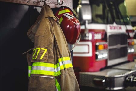 Turnout gear hanging in fire station